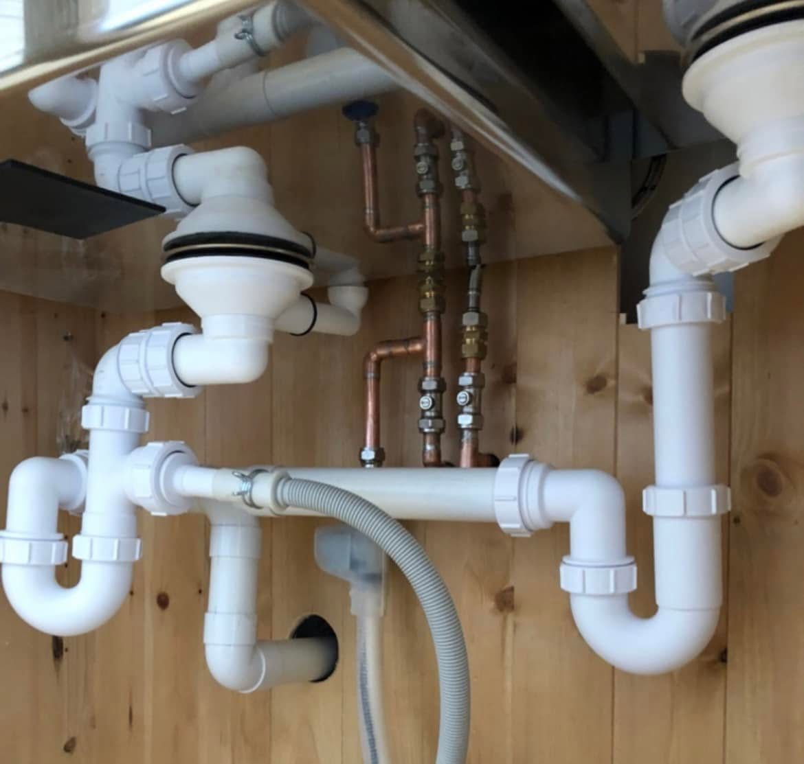 Neat under-sink plumbing pipework in Exeter